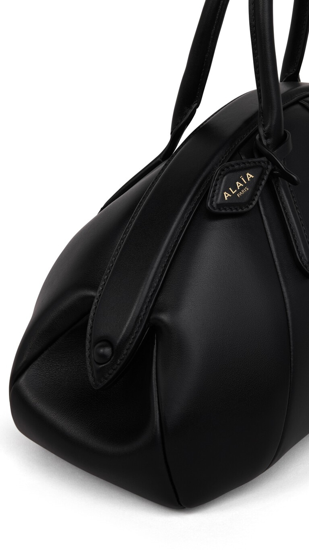ALAÏA СУМКА С ВЕРХНЕЙ РУЧКОЙ ИЗ ТЕЛЯЧЬЕЙ КОЖИ, ЧЕРНЫЙ