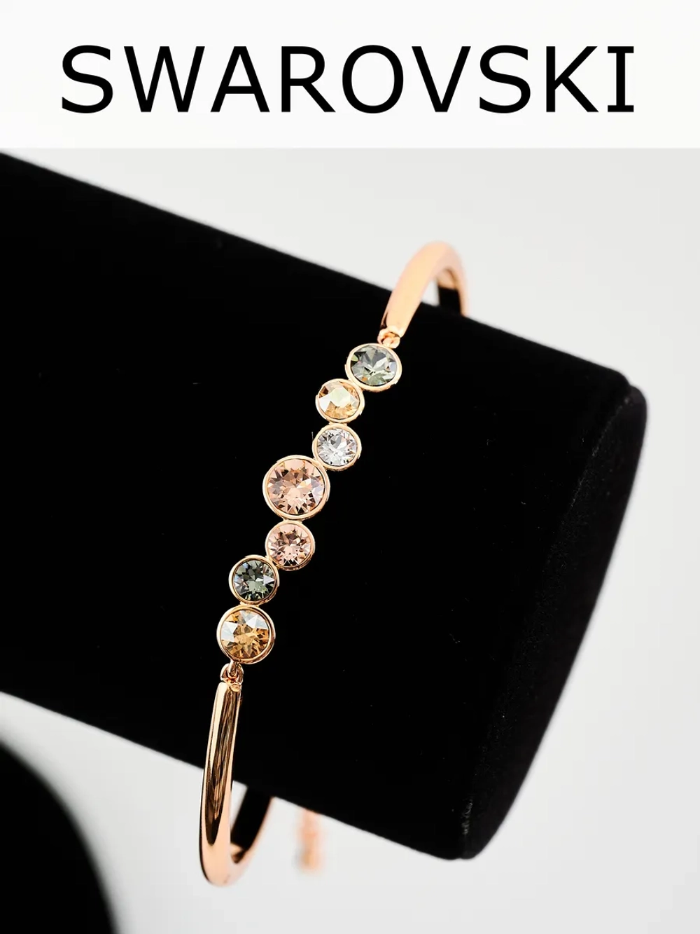 Жесткий браслет Эльза с камнями Swarovski шампань