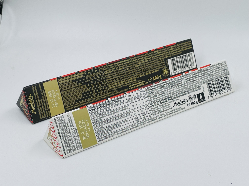 Toblerone темный шоколад с медом и нугой 100 г + белый шоколад с медом и нугой 100 г (Швейцария)