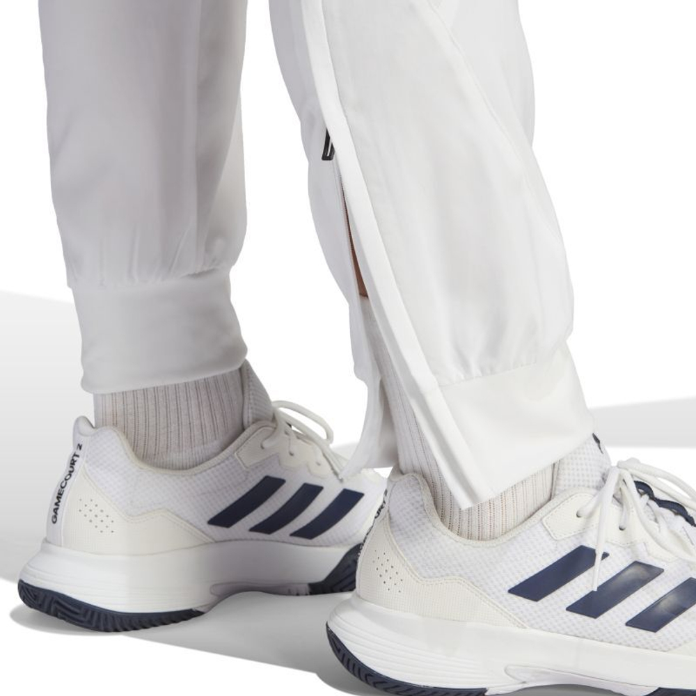 Мужские теннисные штаны Adidas Woven Pant Pro - белый