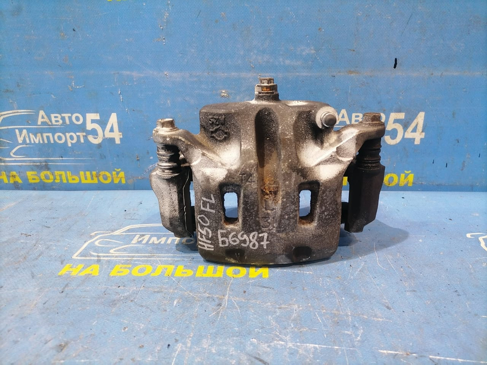 Суппорт тормозной передний левый NISSAN CIMA 2001-2010