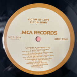 Винтажная виниловая пластинка LP Elton John Victim Of Love (США 1979)
