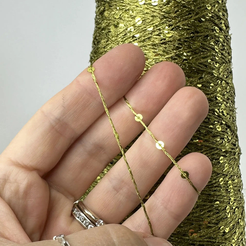 MONALISA - PINORI Filati; вискоза, п/а, пайетки 3мм, через каждые 10мм; 330м/100гр; цвет: оливковый; ТОЛЬКО !! 45, 190 гр