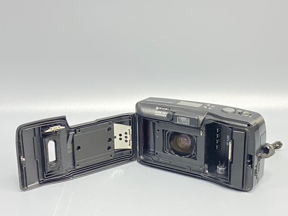 Olympus SuperZoom 105 мажет мимо пленки