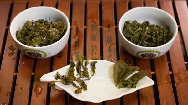 Тегуаньинь: эффект, вкус и свойства чая, польза и вред улуна для организма Тегуаньинь: эффект, вкус и свойства чая, польза и вред улуна для организма