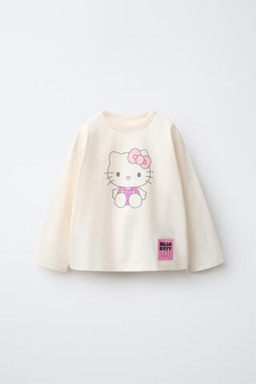 ZARA ФУТБОЛКА С БЛЕСКОМ HELLO KITTY ©, ЭКРЮ