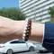 Классический браслет из магнезита вид на руке с бронзитом