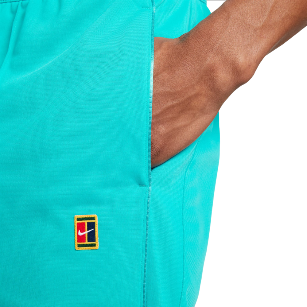Мужские теннисные штаны Nike Court Heritage Suit Pant - teal nebula/teal nebula