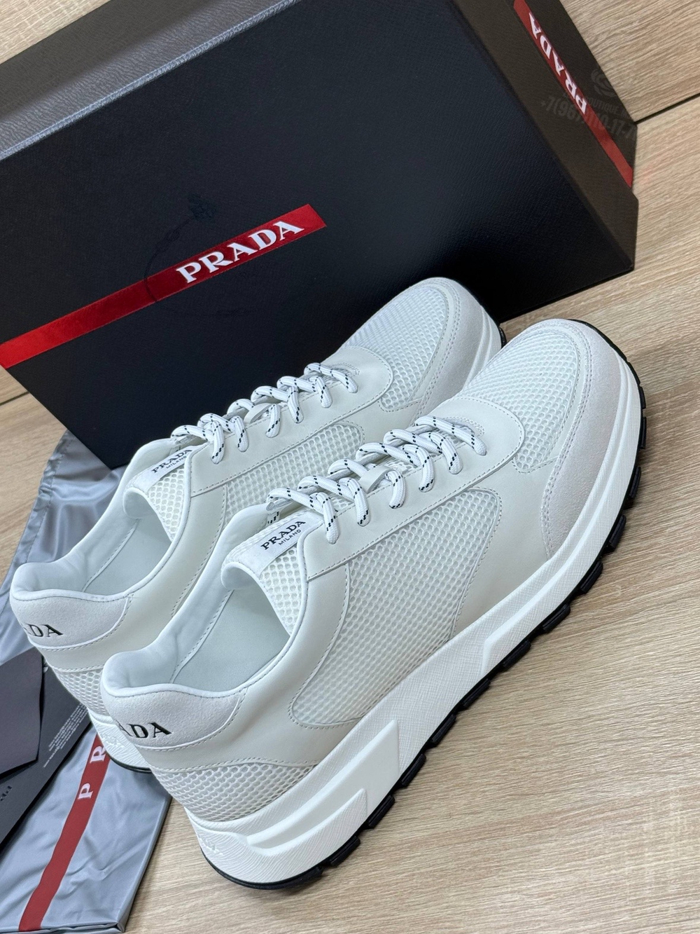 Кроссовки Prada