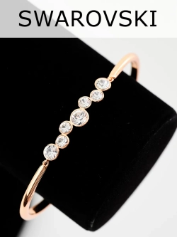 Жесткий браслет Эльза с белыми камнями Swarovski