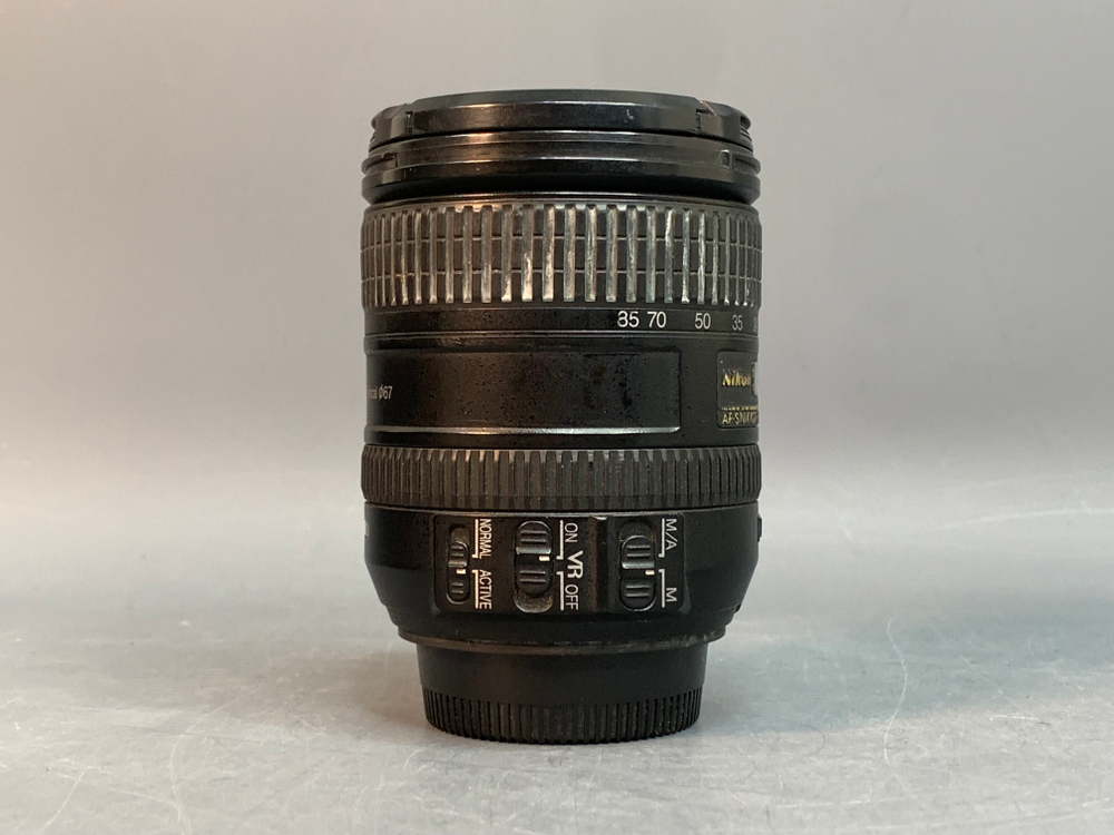 Nikon 16-85mm 3.5-5.6G ED VR царапины перед линзе