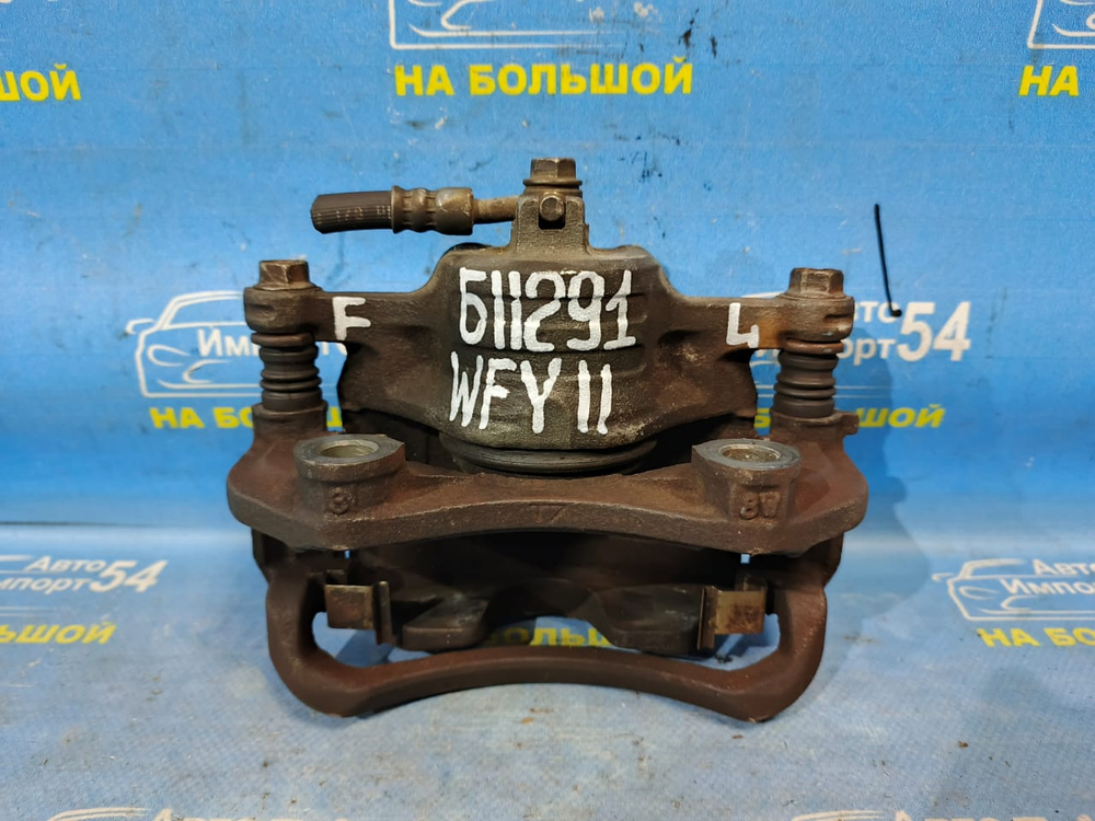 Суппорт тормозной передний левый NISSAN WINGROAD 1999-2005