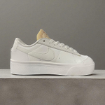 Nike Blazer Low Platform • Triple White