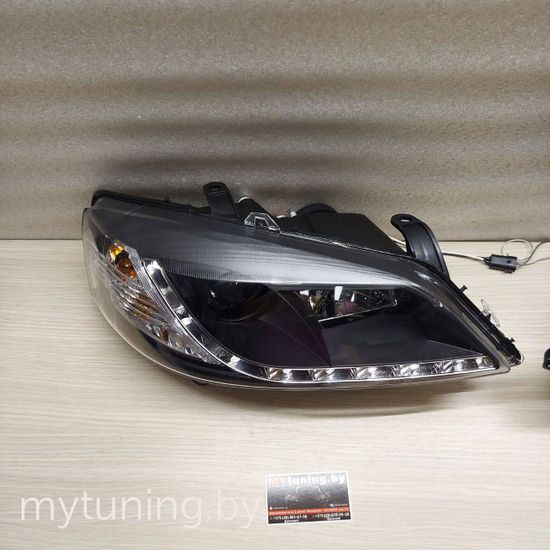 Передние фары Opel Astra G daylight black