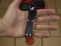 Нож Microtech Ultratech TFS/E - черная рукоять, клинок серрейторный RK-401