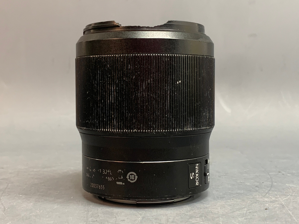 Nikon 50mm 1.8S Nikkor Z Царапина в внутри линзы