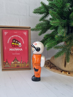 Игрушка фарфоровая космонавт