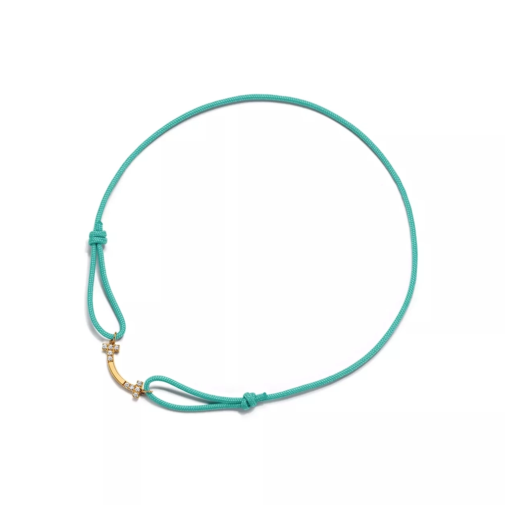 Браслет из жёлтого золота с бриллиантами на шнурке, Tiffany 💠 T smile