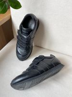 Кроссовки Prada
