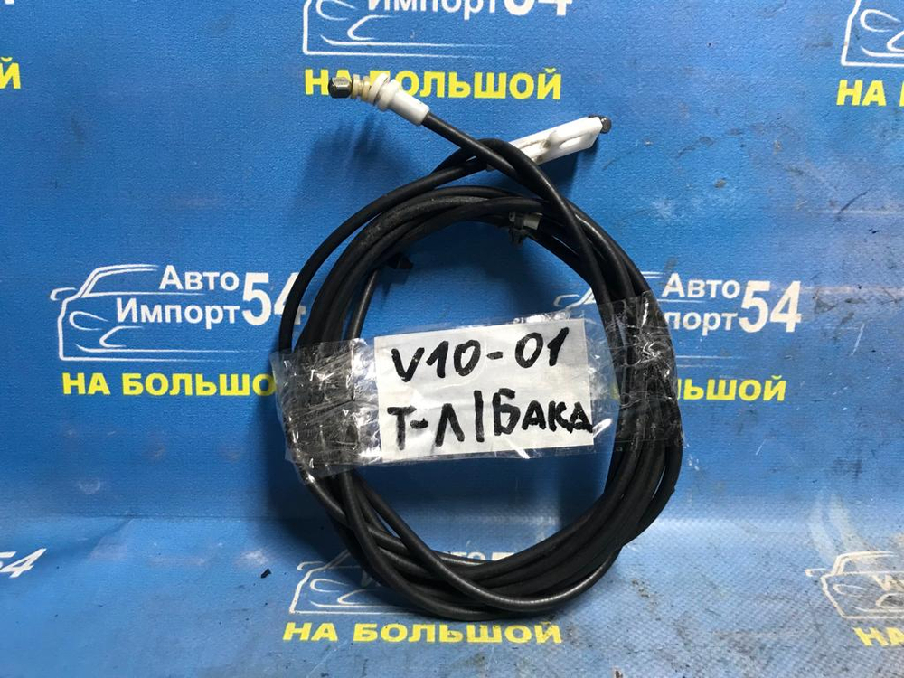 Трос лючка бензобака NISSAN TINO 2000