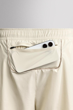 ZARA СПОРТИВНЫЕ ШОРТЫ ДЛЯ БЕГА 7”, КОСТЯНОЙ