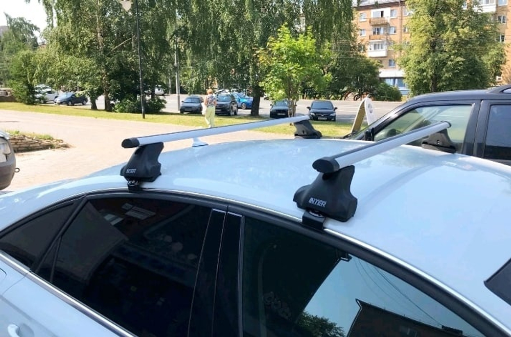Багажник Интер Спектр на Chevrolet Aveo II седан 2011-2015  аэродинамические  дуги 120 см.