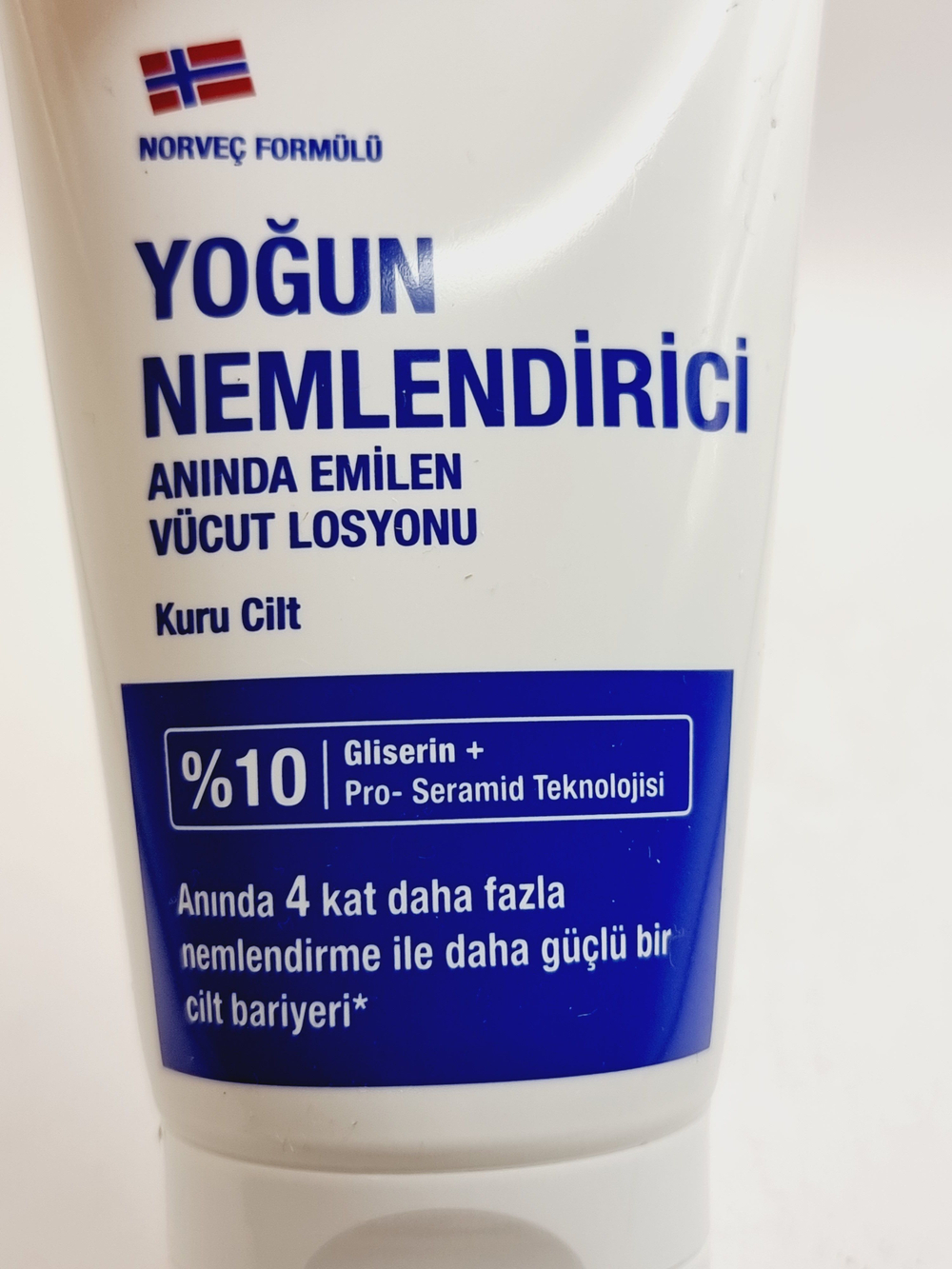 NEUTROGENA увлажняющий мгновенно впитывающийся лосьон для тела с технологией Pro-Ceramide75 мл (Франция)