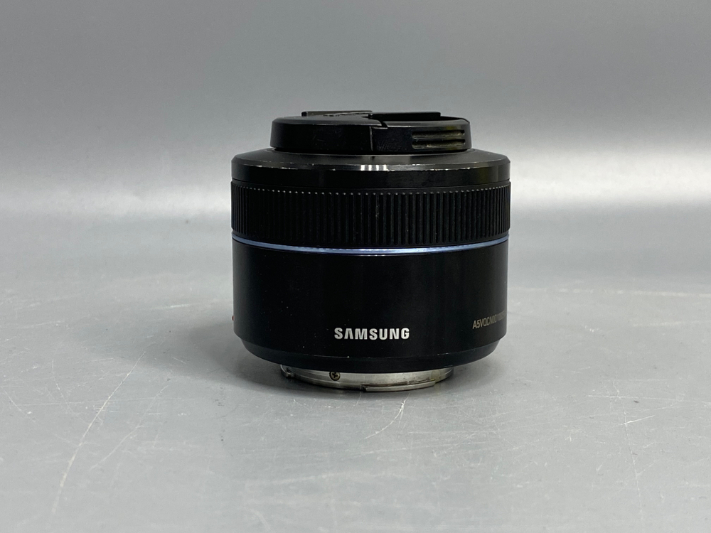 Samsung 45mm f/1.8 пыль внутри объектива