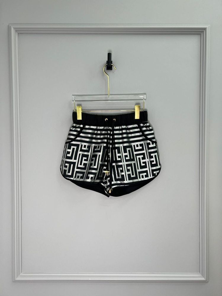 Джинсы Versace