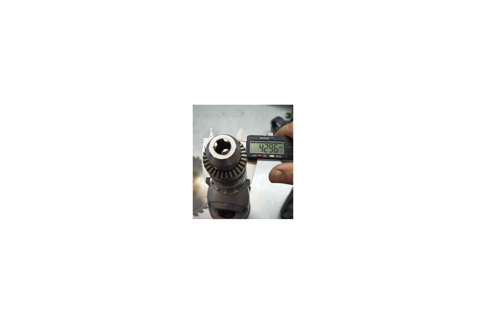 Ударная дрель Makita HP 2070