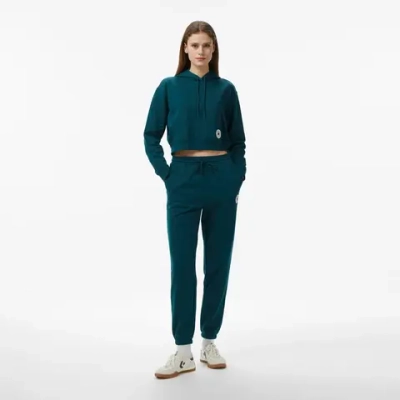 Женские зеленые спортивные штаны Converse- CONVERSE