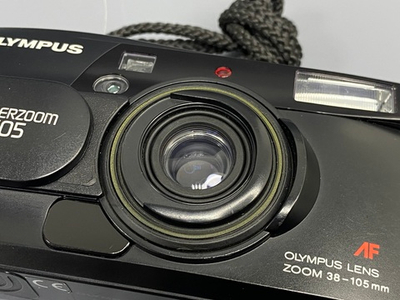 Olympus SuperZoom 105 мажет мимо пленки