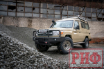 Бампер передний Toyota Land Cruiser 76/78/79 2007+ c доп. фарами и защитной дугой, под штатную лебедку РИФ