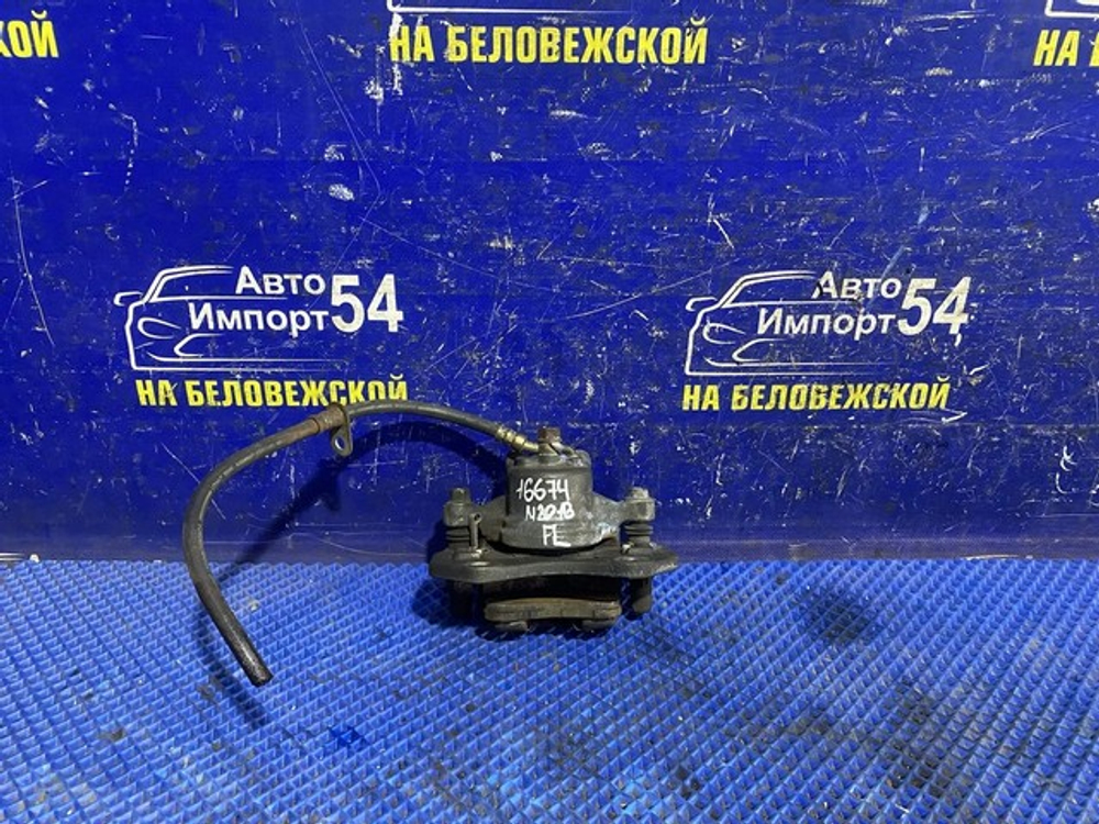 Суппорт тормозной передний левый DAIHATSU YRV 2000-2005