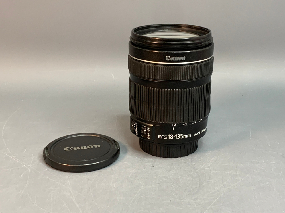 Canon 18-135mm IS STM, царапина на передней линзе
