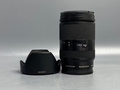 Sony 18-200mm f/3.5-6.3 E LE точки под передней линзе