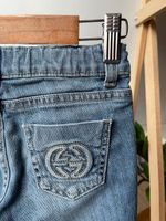 Джинсы Gucci, 104