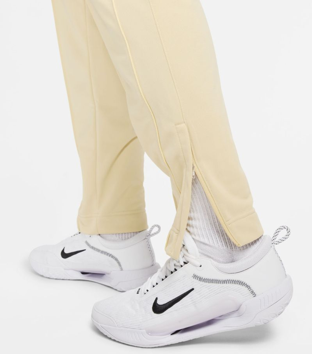 Мужские теннисные штаны Nike Court Heritage Suit Pant - team gold