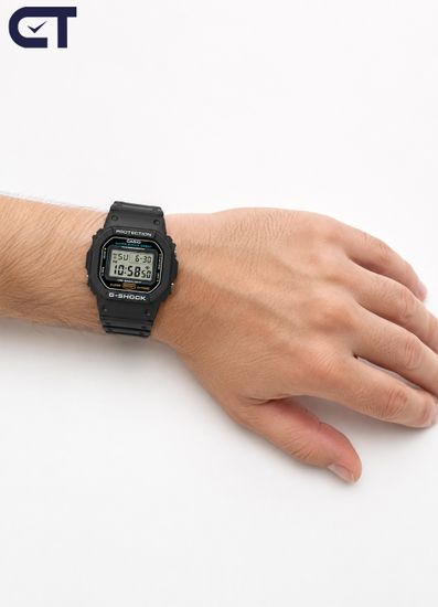 Casio DW-5600UE-1DR мужские часы — классические ударопрочные G-SHOCK с WR200