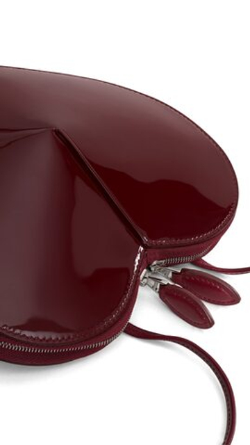 ALAÏA СУМКА LE CŒUR ИЗ ТЕЛЯЧЬЕЙ КОЖИ, ГРАНАТОВЫЙ