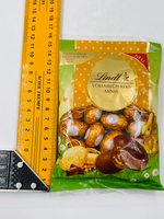 Lindt мини-яйца из молочного шоколада с кусочками печенья, 100 г