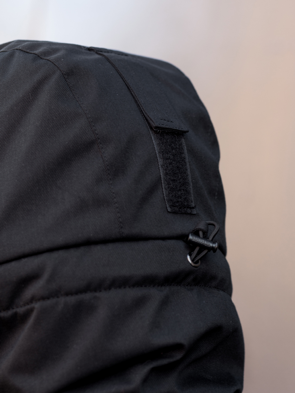 Black windbreaker