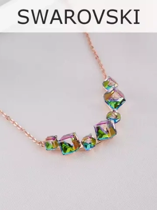 Колье дуга Мираж с зелеными кристаллами Swarovski