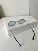 Очки Valentino
