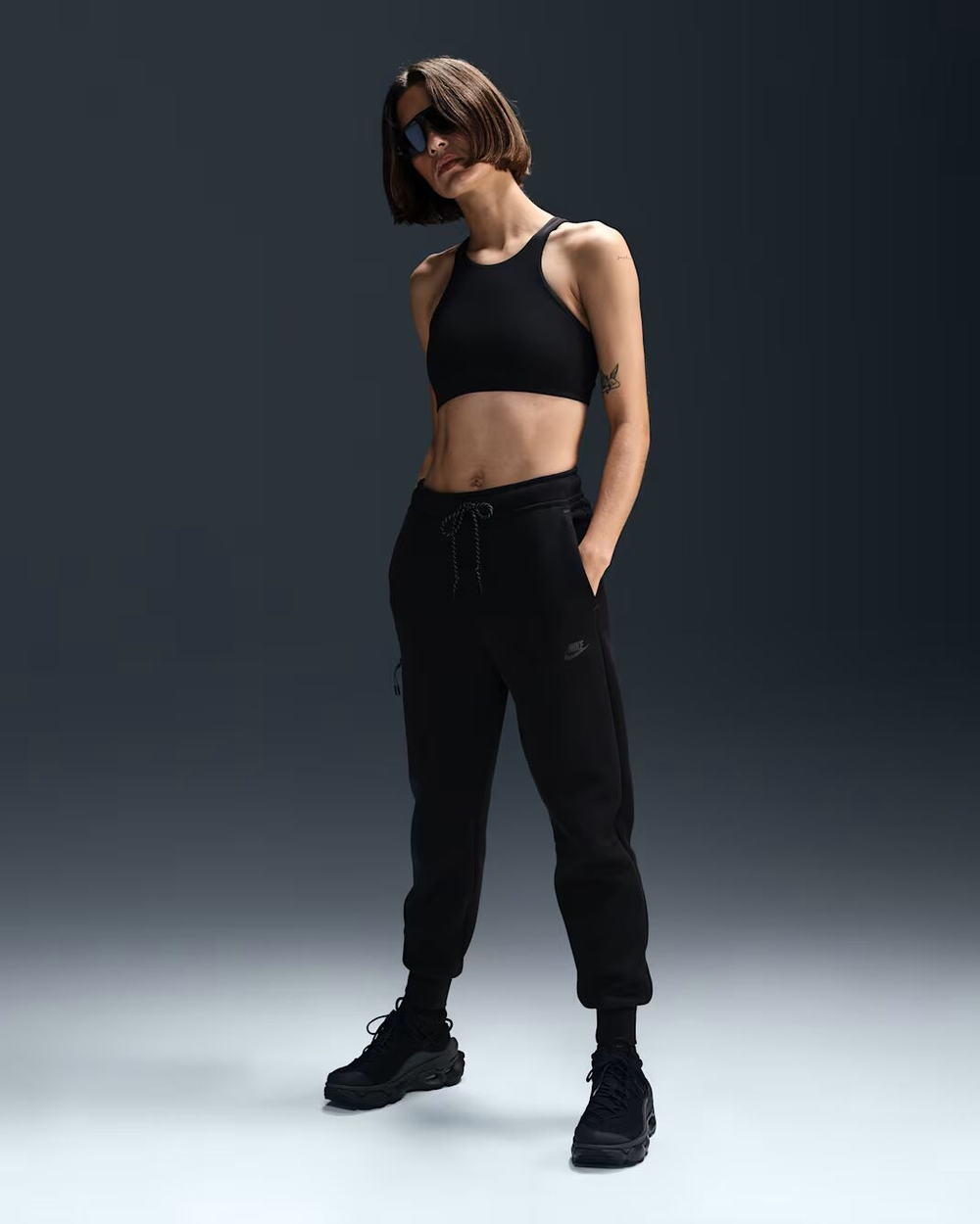 Nike Sportswear Tech Fleece Женские джоггеры с нормальной посадкой - NIKE