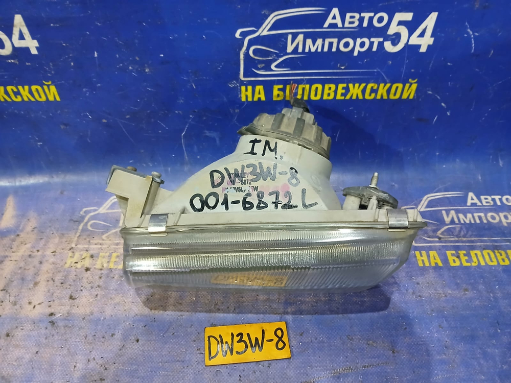 Фара передняя левая MAZDA DEMIO 1998