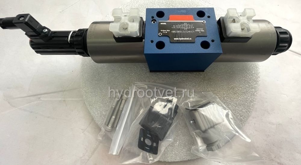 4WRE10W25-2X/G24K4/V - Пропорциональный распределитель с обратной связью по положению золотника без встроенной электроники Ду10, номинальный расход 25 л/мин, схема W