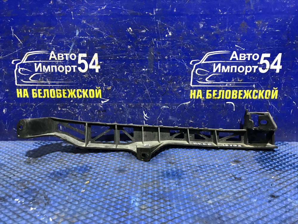 Планка под фару левая MAZDA AXELA 2003-2006