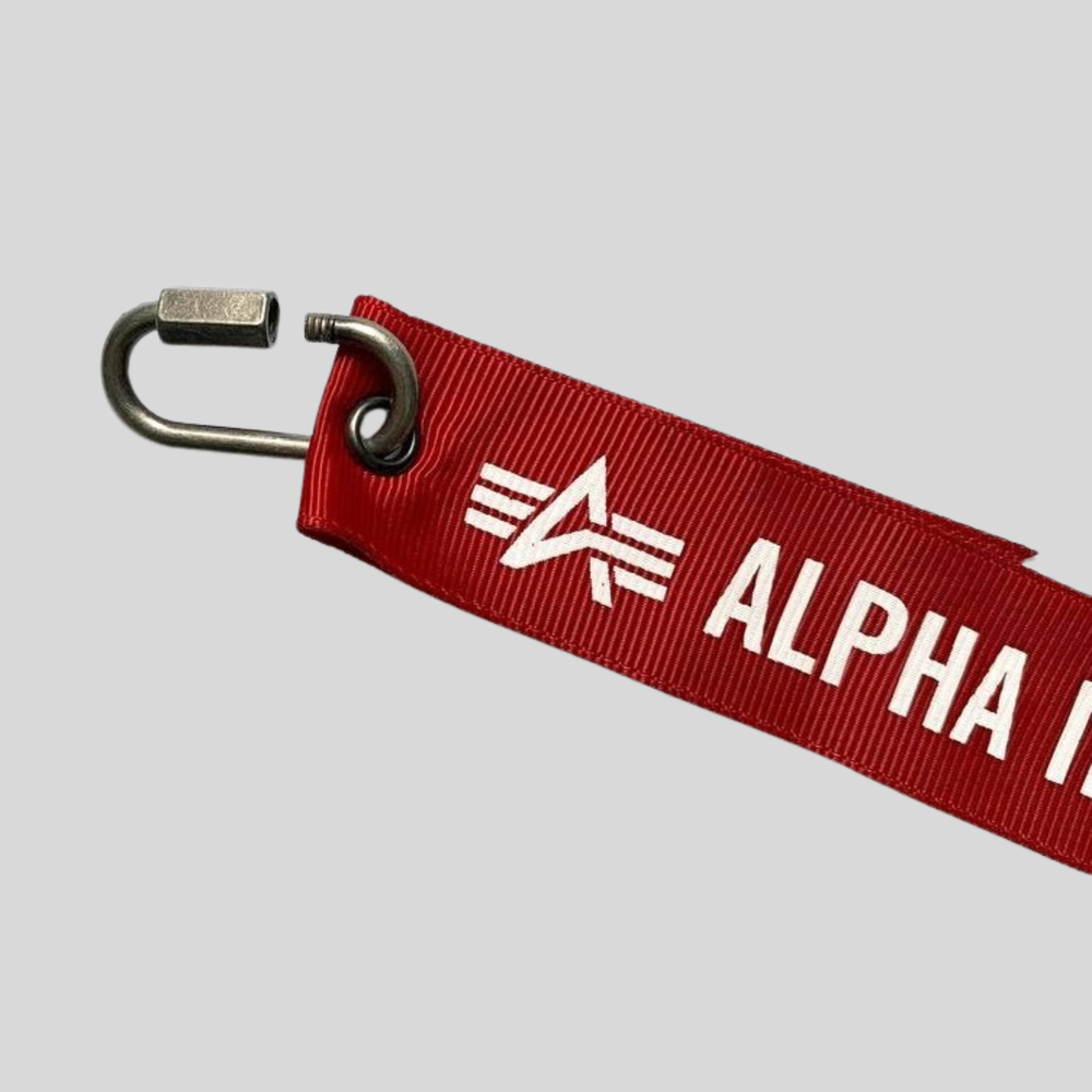 Лента брелок Alpha Industries «Remove Before Flight 2021»