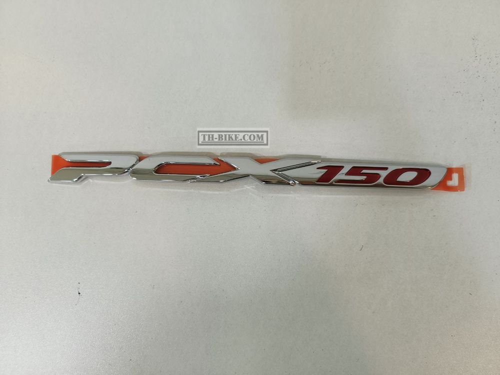 87140-KZY-700. EMBLEM, L. BODY COVER. HONDA